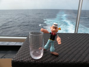 Popeye figure with a drink