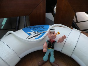 Popeye figure with a life preserver