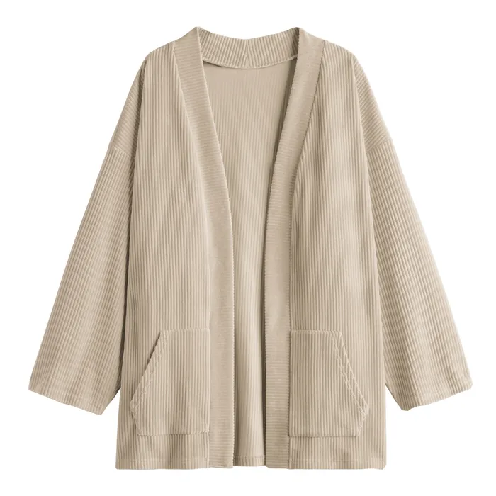 Beige ribbed open cardigan with patch pockets, laid flat on white