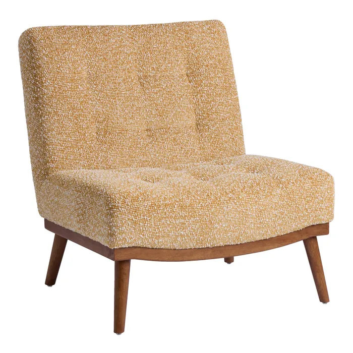 Mustard tufted bouclé accent chair with wood legs, three-quarter view on white